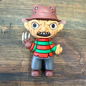 Striped Sweater Monster Figure